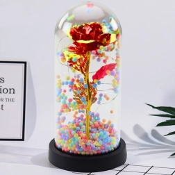 Rose éternelle sous cloche avec éclairage LED et billes colorées rouge