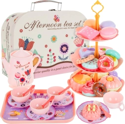 Service à thé pour enfants dans une valisette avec gâteaux et mignardises