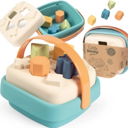 Smoby petit trieur vert dans un panier en bioplastique