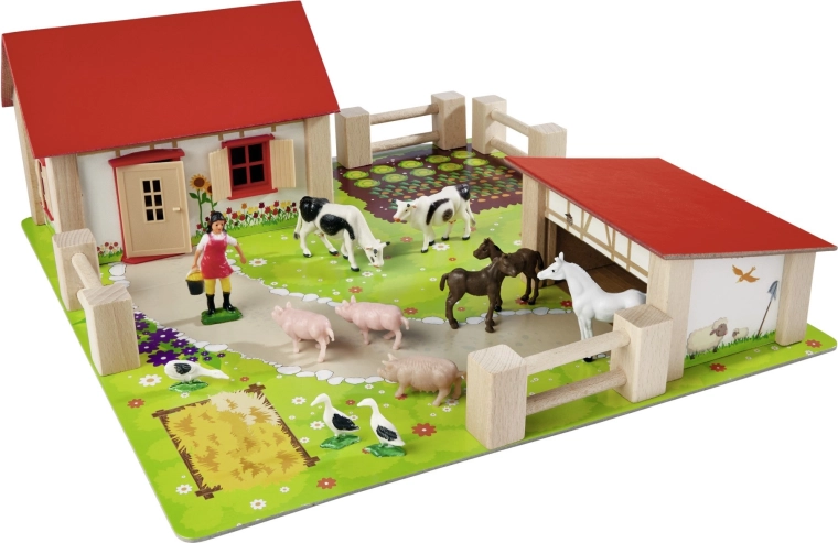 Bâtiments en bois stables avec toit rouge