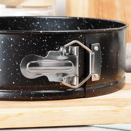 Bord à charnière avec loquet de sécurité