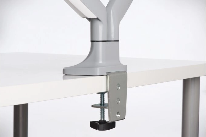 Fixation stable au bureau : pince ou passe-câble