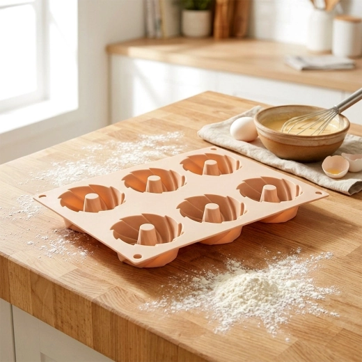 6 cavités avec cheminée pour une cuisson uniforme