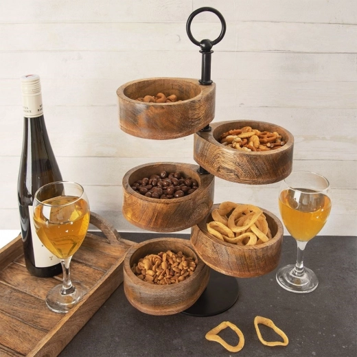 Cinq coupelles pivotantes pour un service efficace