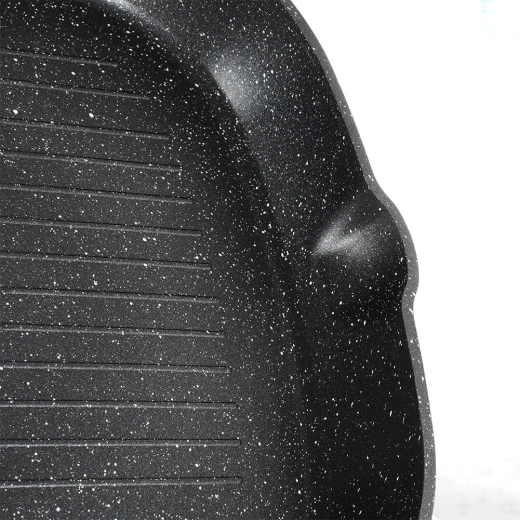 Double bec verseur et poignée ergonomique