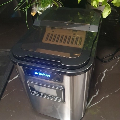 Écran LCD, horloge et minuterie pour un démarrage programmé