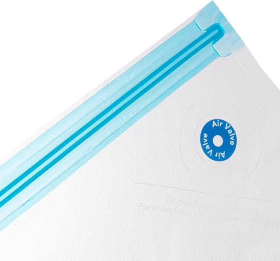 Double zip et valve pour un vide parfait