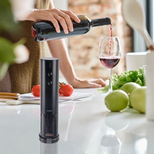 Découpe-capsule intégré au socle