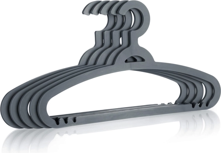 Barre inférieure pour pantalons et écharpes