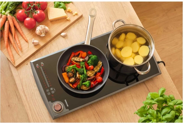 Deux foyers pour cuisiner confortablement