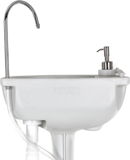 Distributeur de savon intégré et accessoires pratiques