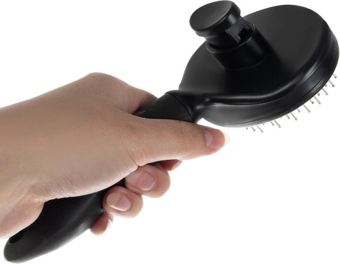 Bouton auto-nettoyant pour un retrait rapide des poils
