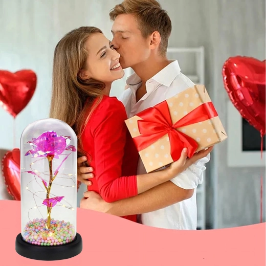 Rose lumineuse sous verre