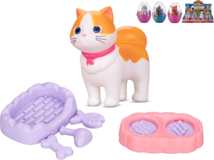 Figurine de chat dans un œuf avec accessoires