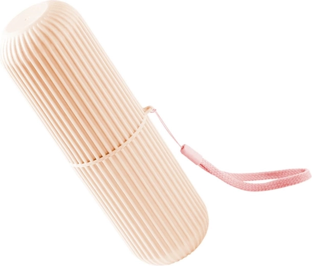 Étui rose pour brosse à dents et dentifrice