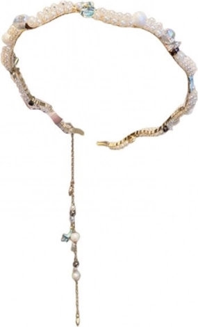 Serre-tête décoratif avec motif de coquillages et perles