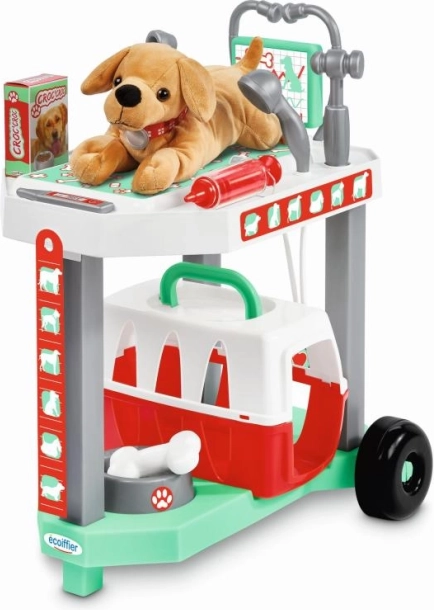 Chariot de petit vétérinaire avec chien en peluche
