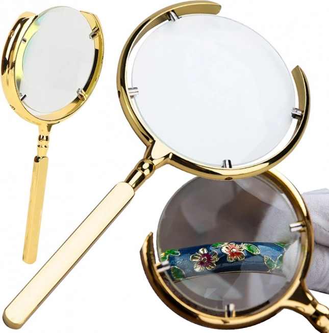 Loupe manuelle dorée 6× avec cadre métallique et lentille en verre