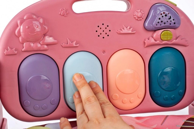 Tapis d'éveil éducatif rose avec piano et hochets