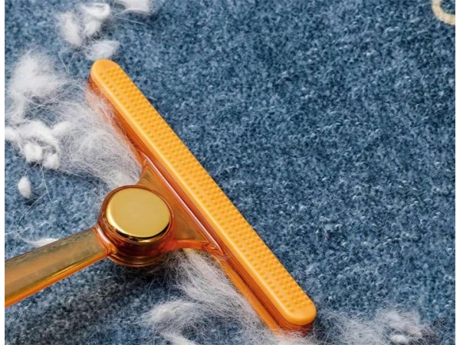 Brosse réversible pour éliminer les poils de chien des tapis