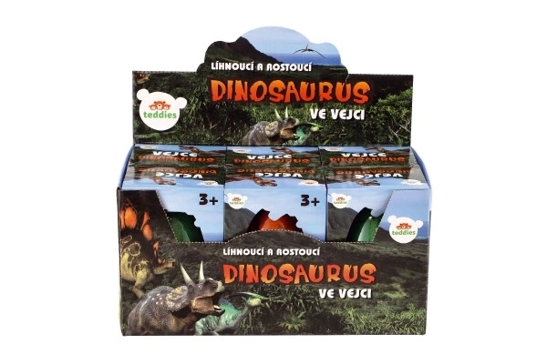 Œuf avec dinosaure éclosant
