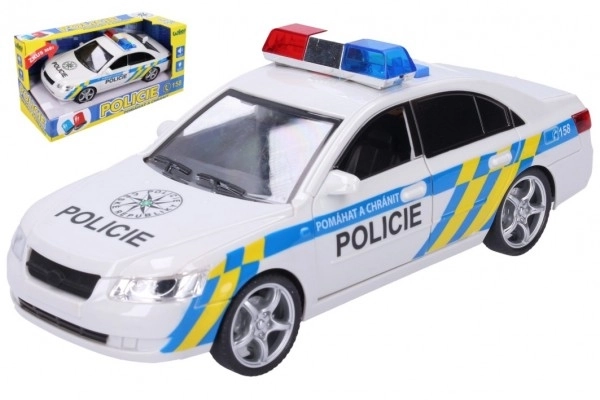 Voiture de police en plastique 24cm sur batterie avec son et lumière en boîte 28x14,5x12cm
