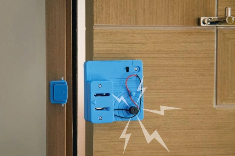 Alarme sonore à l’ouverture de la porte