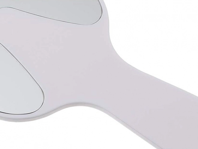 Miroir cosmétique en forme de dent