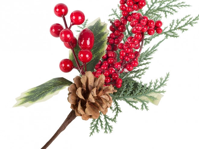Élément décoratif de centre de table de Noël avec des sorbes et une pomme de pin