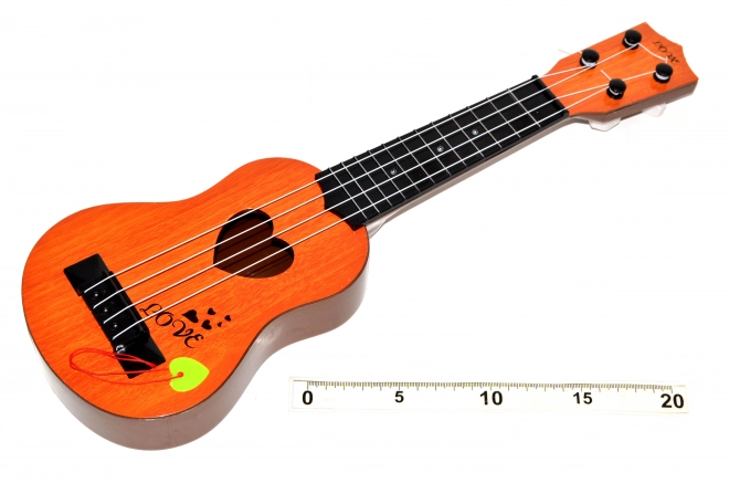 Guitare avec médiator 43 cm
