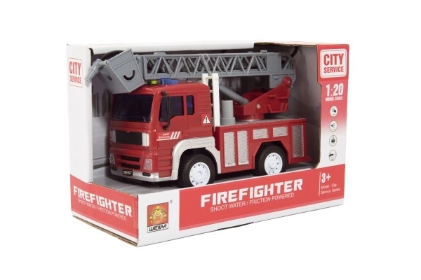 Camion de pompiers avec lance à eau et effets lumineux