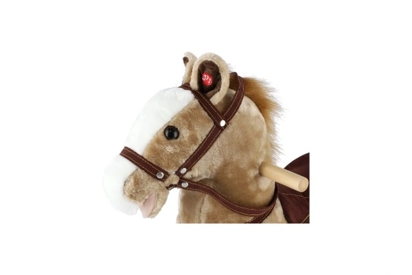 Cheval à bascule en peluche brun clair avec effets