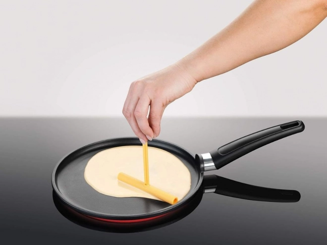 Spatule et rouleau à crêpes