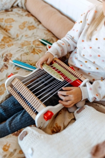 Grand bouton de tension pour les mains des enfants