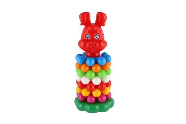 Puzzle pyramide avec anneaux en plastique 26cm dans un filet 12m+