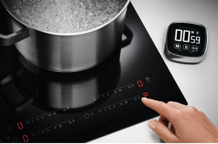 Commandes tactiles intuitives et minuteur pratique