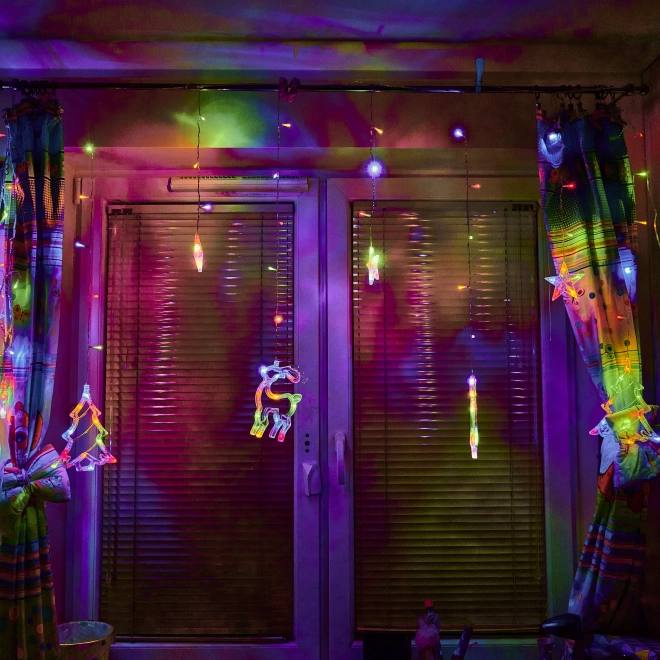 Rideau LED multicolore avec motifs de Noël - 2,5 m, 138 LED
