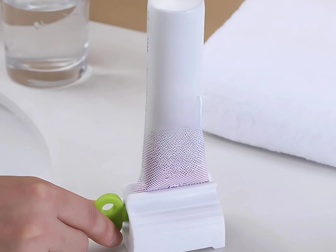 Presse-tube pour crèmes et dentifrice