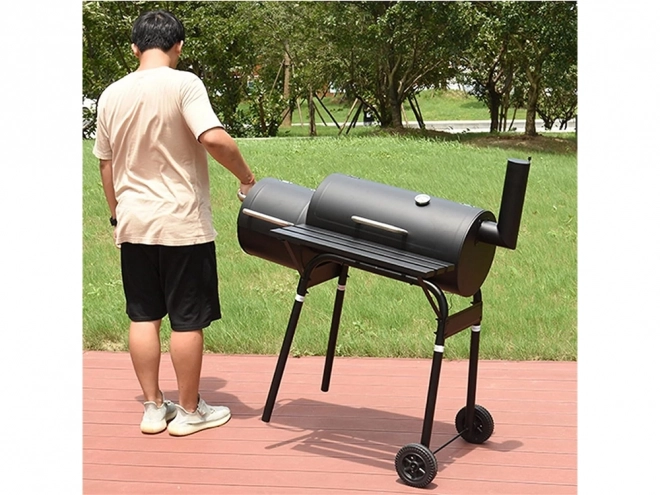 Barbecue de jardin au charbon de bois avec fumoir et roulettes