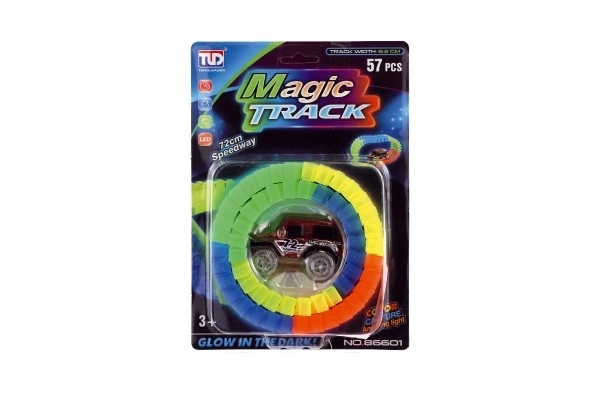 Circuit lumineux dans le noir + voiture à piles en plastique 57 pièces longueur 72cm sur carte 17x24x7cm