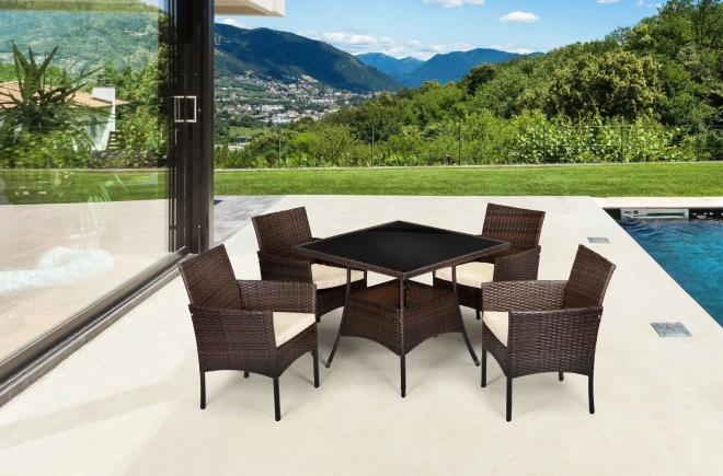 Mobilier de jardin en rotin PREGASIO avec 4 chaises et table avec plateau en verre