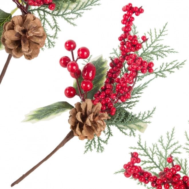 Élément décoratif de centre de table de Noël avec des sorbes et une pomme de pin