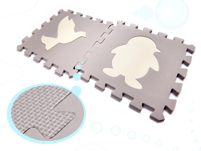 Puzzle mousse beige contrastée avec animaux