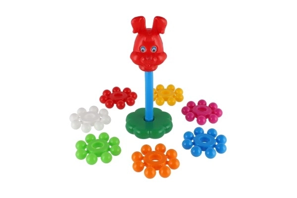 Puzzle pyramide avec anneaux en plastique 26cm dans un filet 12m+