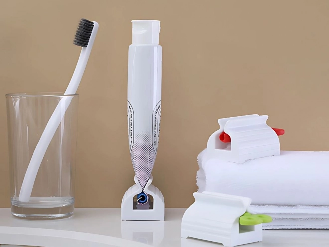 Presse-tube pour crèmes et dentifrice