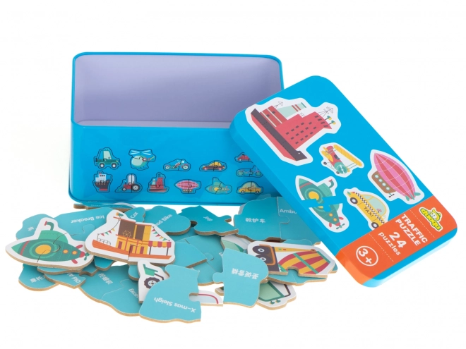 Puzzle avec motifs de moyens de transport dans une boîte en métal