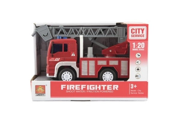 Camion de pompiers avec lance à eau et effets lumineux