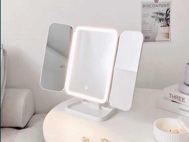 Miroir cosmétique pliable à LED avec éclairage et grossissement