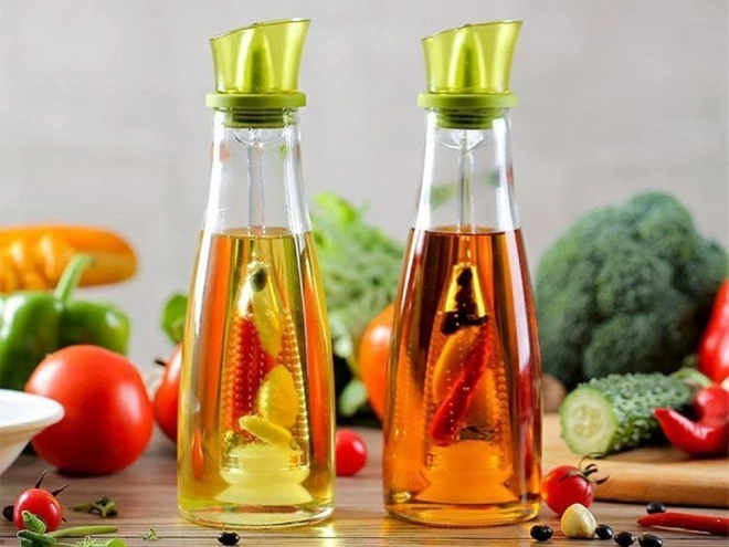 Bouteille en verre pour huile et vinaigre avec doseur intégré pour herbes