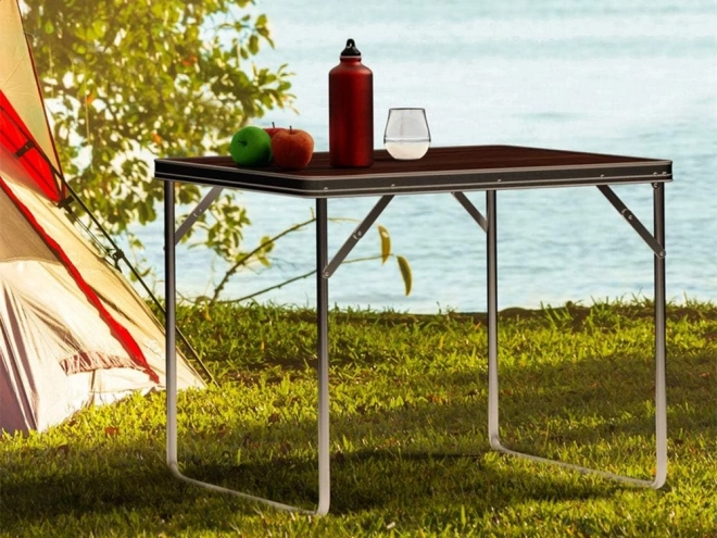 Table de jardin pliante avec poignée